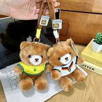 Collection de peluches ours footballeur assis tendance avec expressions faciales expressives, mini-animaux en peluche pour compagnon de bureau, cadeau Kawaii