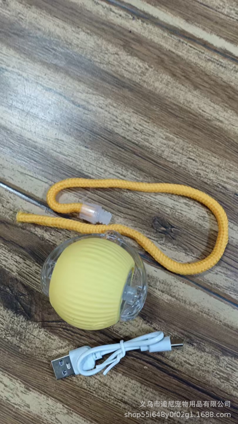 Jaune avec balle en corde