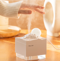 Humidificateur de bureau et veilleuse d'ambiance style Nouvelle Lune, compatible avec les huiles essentielles d'aromathérapie