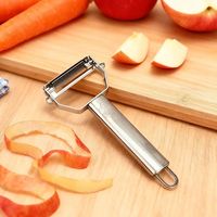 Das Multifunctionele Roestvrijstalen Fruit-En Groentevisschaalschiller Keukengerei Aardappelsnijmachine