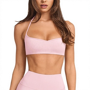 Women's Pink Halter Neckline Seamless Sports Bra Medium Support Yoga Workout Top V-Neck Strap Solid Color - Product Image 1