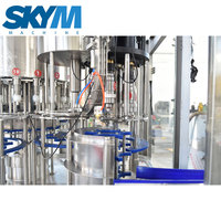 Usine d'huile pour huile comestible Machine de remplissage de bouteilles d'huile alimentaire de type rotatif entièrement automatique