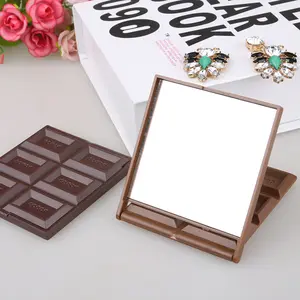 Precio barato lindo Chocolate forma cuadrado pequeño pliegue espejo de maquillaje logotipo personalizado cosmético portátil mini bolsillo espejos de viaje