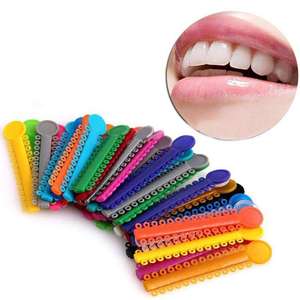 Matériaux d'orthodontie de haute qualité, ligatures élastiques colorées jetables pour traitement orthodontique dentaire - Product Image 1