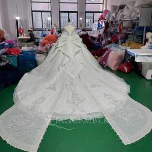 Vestido de Novia Romántico Mc062 Color Marfil con Hombros Descubiertos, Apliques de Encaje Plateado, Cuentas de Cristal y Mangas con Volantes, Estilo Princesa, Marca Jancember - Product Image 2