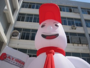 Inflatable Man Handing Autoglaser for Advertising Events - Product Image 4
