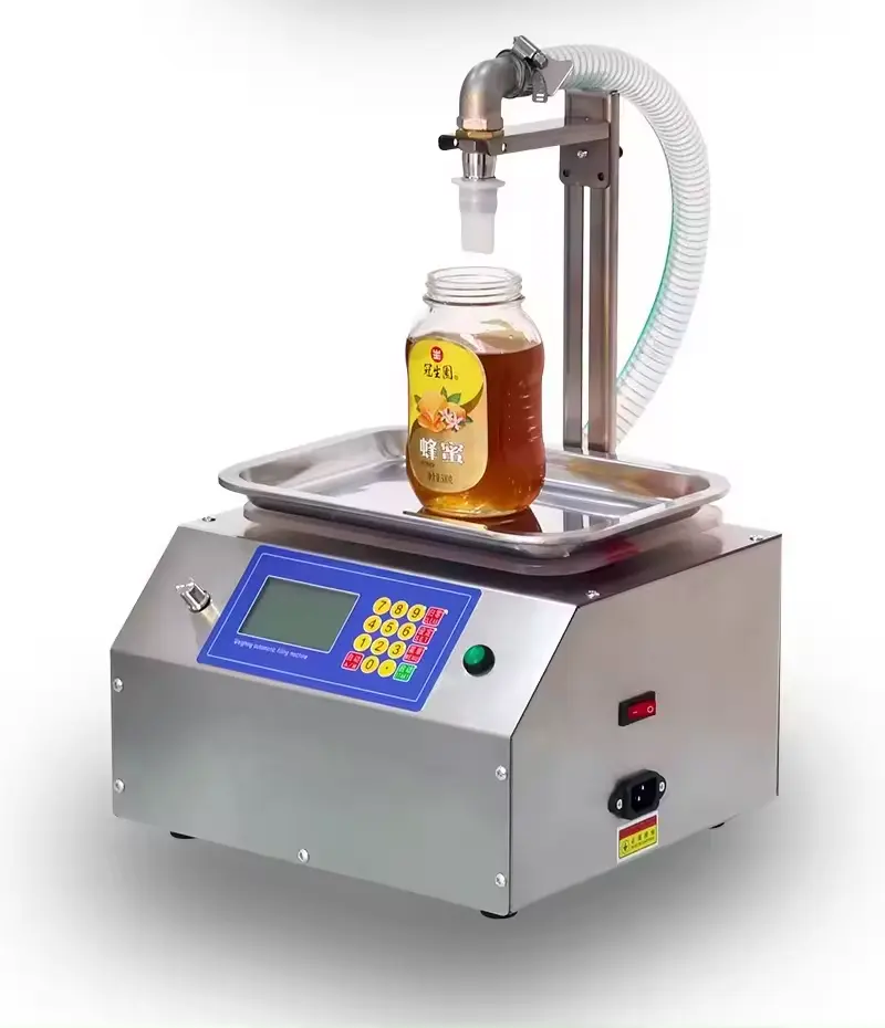 Machine de remplissage manuelle semi-automatique de savon liquide de confiture de crème de bouteille pour le shampooing de pâte de crème et de gel