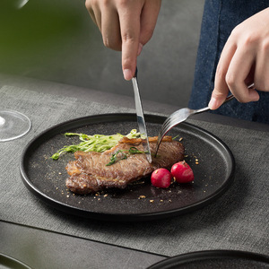 จานเสิร์ฟสเต็กทรงกลมสีดำเคลือบเซรามิกสำหรับใช้ในโรงแรมร้านอาหาร - Product Image 3