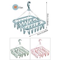 Séchoir à linge pliable en plastique à 32 pinces avec support suspendu, emballé en carton, design peu encombrant pour vêtements, sous-vêtements et chaussettes