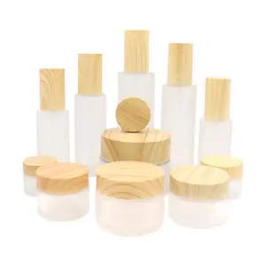 Bouteille de lotion en verre dépoli écologique avec couvercle en bois et bambou, ensemble d'emballage pour les soins de la peau