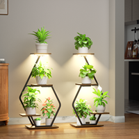 Rak Tanaman Kayu 4 Tingkat dengan Lampu LED, Bingkai Logam, Rak Pajangan Tanaman Indoor OEM ODM Logo Kustom