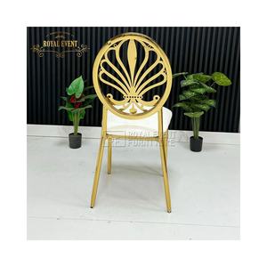 כסא חתונה ממתכת בציפוי כרום זהוב מבריק ויפה, עמיד וזול במבצע חם מהמפעל, עם מושב לבן לאירועים וחתונות. - Product Image 4