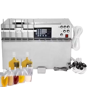 Fruit <b>Juice</b> Liquid Bottle Semi Automatic <b>Juice</b> Bottle Filling <b>Machine</b> Used 4 Nozzle Filling <b>Machine</b> Multi-jet Filling <b>Machine</b> - Product Image 1
