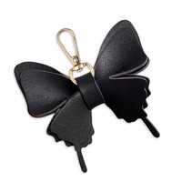 Vente en gros de pendentifs papillons colorés créatifs en corde de cuir sac en corde de coton porte-clés pendentifs de dessin animé