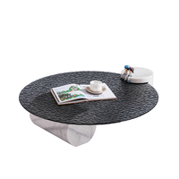 Table basse ronde en verre trempé à texture d'eau ondulée noire de luxe moderne avec pieds en colonne de marbre pour salon