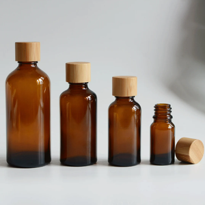 Luxury 1-100ml <strong>Amber</strong> <strong>Glass</strong> Spa Oil Container With Natural Bamboo Cap Essential Body Oil Refill Empty Oil <strong>Bottle</strong> - Product Image 1