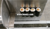 LIGNE DE PRODUCTION DE SUSHI ONIGIRI Machine à former des onigiri avec du nori Moulin à riz automatique à haute efficacité 100-6000 pièces/h