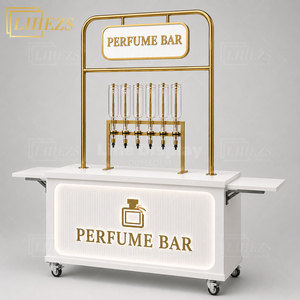 Bar à parfums mobile pliable en or blanc personnalisé, comptoir <span class=keywords><strong>de</strong></span> distribution <span class=keywords><strong>de</strong></span> parfums portable pour les boutiques <span class=keywords><strong>de</strong></span> parfums et les stands éphémères en centres commerciaux - Product Image 1