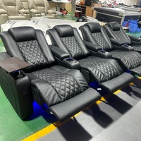 Diseño moderno negro Home Theater Asientos Power Reposacabezas Home Theater Uso especial Muebles de teatro Sofá con tableta de escritura