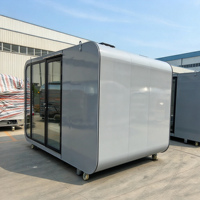 Cabane portable Apple, maison préfabriquée modulaire, pod de glamping imperméable avec roulettes, grand verre incurvé pour bureau extérieur et complexe hôtelier