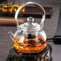 Théière en verre de style contemporain, transparente, 1090 ml, construction durable, infuseur, filtre, résistante à la chaleur, qualité alimentaire, noble