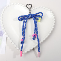 Pendentif de sac en polyester tissé léger, classique et frais, avec cordon de suspension pour téléphone portable et clés, et nœud décoratif