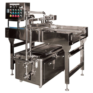 Ligne de production de barres chocolatées pour l'application uniforme de couches de sucre liquide - Product Image 1