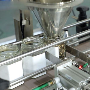 Machine de remplissage et de scellage de sacs de céréales en vrac à prix raisonnable, pour sacs de 1 kg à 10 kg - Product Image 2