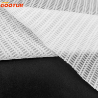 Tissu tricoté en maille respirante avec conception à grille 93% Polyester 7% Spandex Textile pour la fabrication de gilets de course et de vêtements de sport