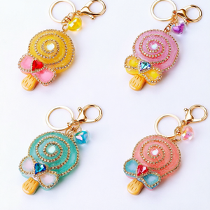 Porte-clés mignon en forme de sucette, rond, en plastique, avec strass, couleurs jaune, rose, bleu, corail, mousqueton - Product Image 1