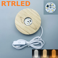 Base de lampe LED ronde en bois innovante pour l'affichage d'œuvres d'art en verre de cristal avec câble USB