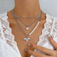 Collier ras du cou vintage style gothique punk avec croix en perles superposées, chaîne à maillons imitation perles, pendentif croix florale plaqué or