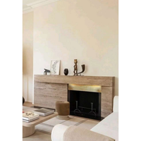 Cheminée en marbre travertin beige monobloc avec cadre en acier intégré pour application intérieure (hôtel, appartement, villa)