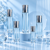 Flacon de lotion en verre transparent de luxe vide, à épaulement plat, avec pompe pulvérisatrice et couvercle argenté, disponible en 60ml, 100ml, 120ml, 150ml, 1oz, 2oz, 4oz, 5oz