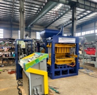 Machine à briques creuses automatique QT4-15B pour la production de blocs de maçonnerie en béton