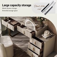 Bureau de toilette moderne de luxe avec plateau en pierre, 360 °   Miroir LED rotatif et armoire latérale rétractable pour chambre à coucher.