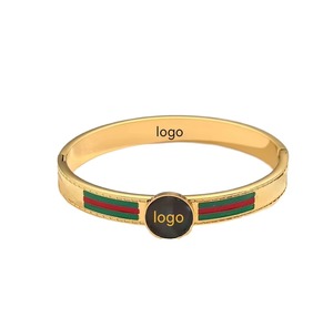 Designer Stainless Steel Bracelet for Women and Children Trendy Gold Plated Logo with Zircon for Parties and Gifts - Product Image 1