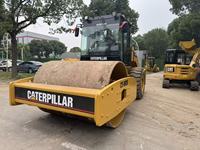 Compacteur routier Caterpillar d'occasion CS683 CS583, rouleau compresseur vibrant à entraînement hydraulique, prix du rouleau compresseur