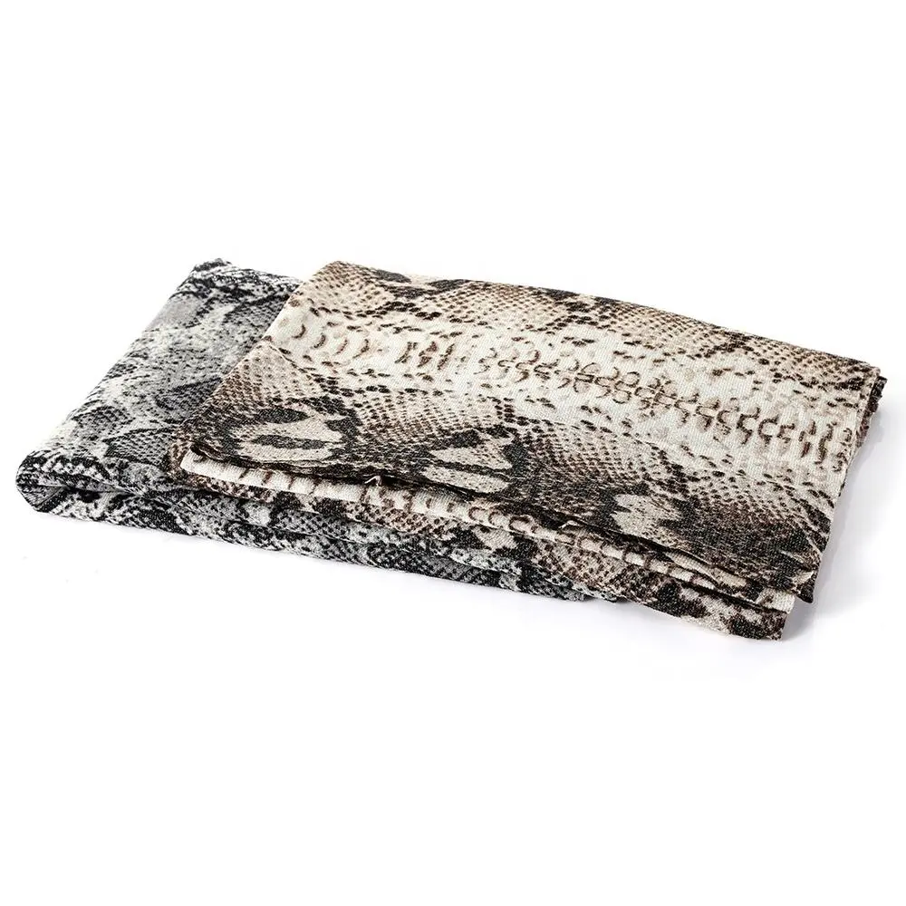 Nouveau design imprimé peau de serpent et motif animal doux tricoté polyester imprimé métallique spandex tricot pour vêtement