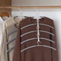 Porte-serviettes multifonctionnel 5 niveaux en métal, design moderne et minimaliste, revêtement éponge anti-traces et antidérapant, rangement gain de place