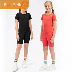 Bambini ragazze 2 pezzi colori puri pantaloncini sportivi vestito da ballo camicia a maniche corte vestiti top allenamento sportivo Fitness yoga wear set