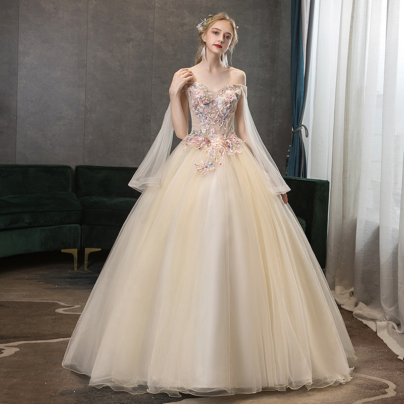 Champagne-colored off-shoulder top