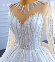 Feishiluo robe de mariée de luxe pour femmes robe de bal ivoire en gros avec manches longues paillettes et décorations florales en organza