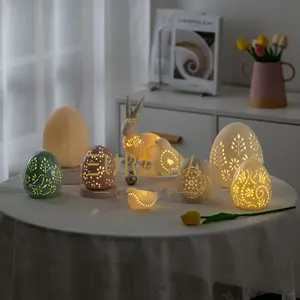 Huevo de Pascua tallado a mano de cerámica, con luz LED