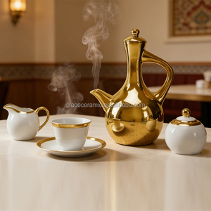Nouvel ensemble <span class=keywords><strong>de</strong></span> café en porcelaine fine plaqué or 17 pièces, tasses à café en céramique africaine éthiopienne, ensemble <span class=keywords><strong>de</strong></span> tasses à <span class=keywords><strong>thé</strong></span> d'Éthiopie - Product Image 1