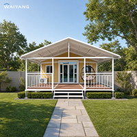 Maison conteneur moderne extensible de luxe de 30 pieds avec structure blanche, caractéristiques imperméables et résistantes au vent, idéale pour hôtel ou bureau