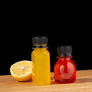 Siyah kapaklı 60ml şeffaf yuvarlak plastik meyve suyu şişeleri-doğrudan fabrikadan - Product Image 1