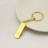 Kaykay Anahtarlığı, 109x30mm, Sırt Çantaları ve Hediyeler için Parlak Metal Spor Çantası Süsü, Altın Gümüş