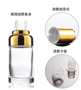 En stock – Flacon compte-gouttes en verre épais pressé de 20/30/50 ml avec bouchon à épaule doré/argenté et sérigraphie pour huiles essentielles - Product Image 2