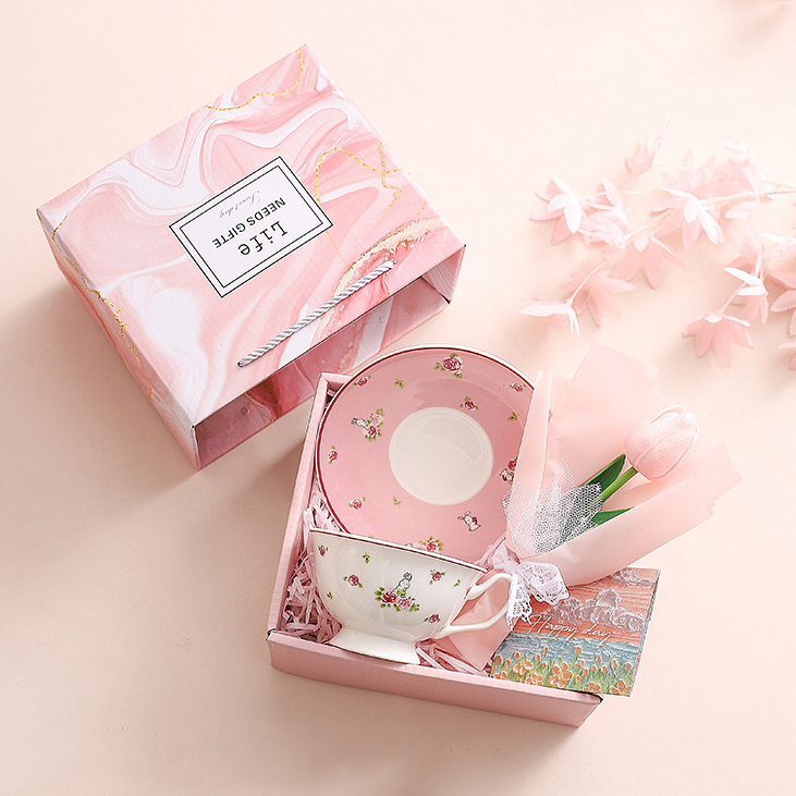 Cup and saucer, card, flower